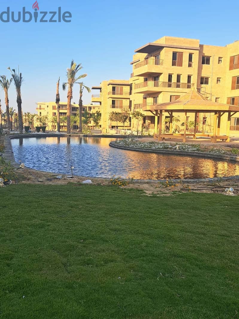 117m apartment on landscape view for sale at a cash price of 5 million after a 39% discount in Taj City Compound, New Cairo 1