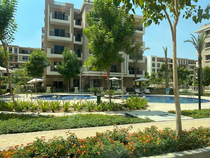 117m apartment on landscape view for sale at a cash price of 5 million after a 39% discount in Taj City Compound, New Cairo 12