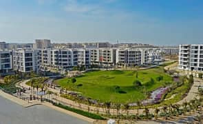 130 sqm ground floor apartment with 45 sqm garden in Taj City Compound in front of Cairo Airport, prime location, cash price 6 million after discount 0