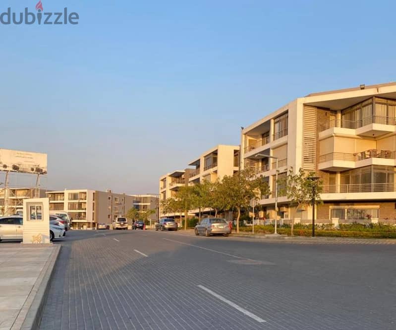 130 sqm ground floor apartment with 45 sqm garden in Taj City Compound in front of Cairo Airport, prime location, cash price 6 million after discount 7