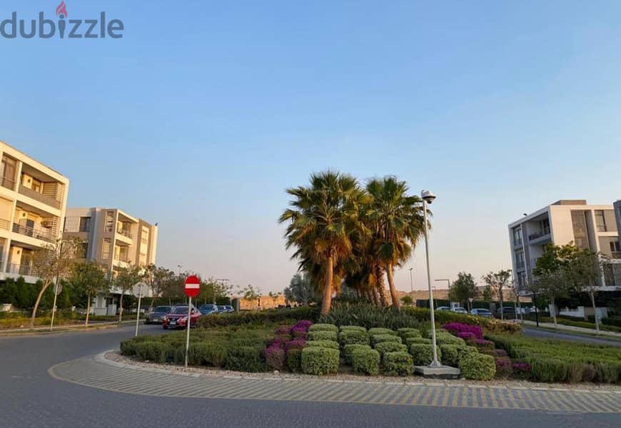 130 sqm ground floor apartment with 45 sqm garden in Taj City Compound in front of Cairo Airport, prime location, cash price 6 million after discount 11