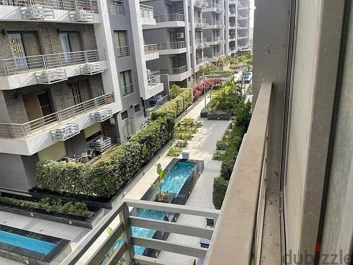 130 sqm ground floor apartment with 45 sqm garden in Taj City Compound in front of Cairo Airport, prime location, cash price 6 million after discount 21