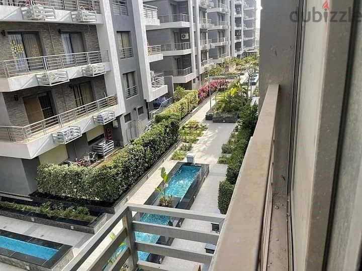 130 sqm ground floor apartment with 45 sqm garden in Taj City Compound in front of Cairo Airport, prime location, cash price 6 million after discount 28