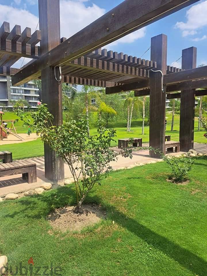 130 sqm ground floor apartment with 45 sqm garden in Taj City Compound in front of Cairo Airport, prime location, cash price 6 million after discount 31