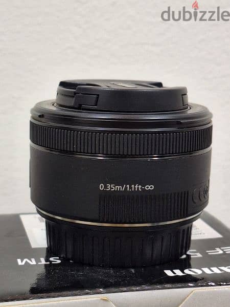 Canon 250D + lens 50 mm f1.8 + lens 18 55 + memory استعمال خفيف جدا 11