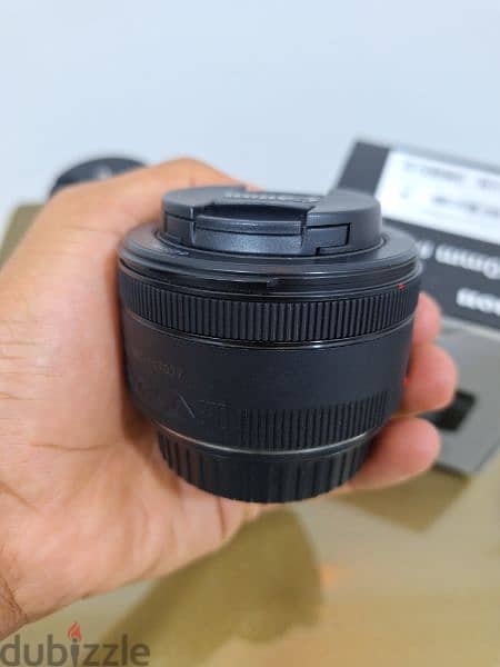 Canon 250D + lens 50 mm f1.8 + lens 18 55 + memory استعمال خفيف جدا 13