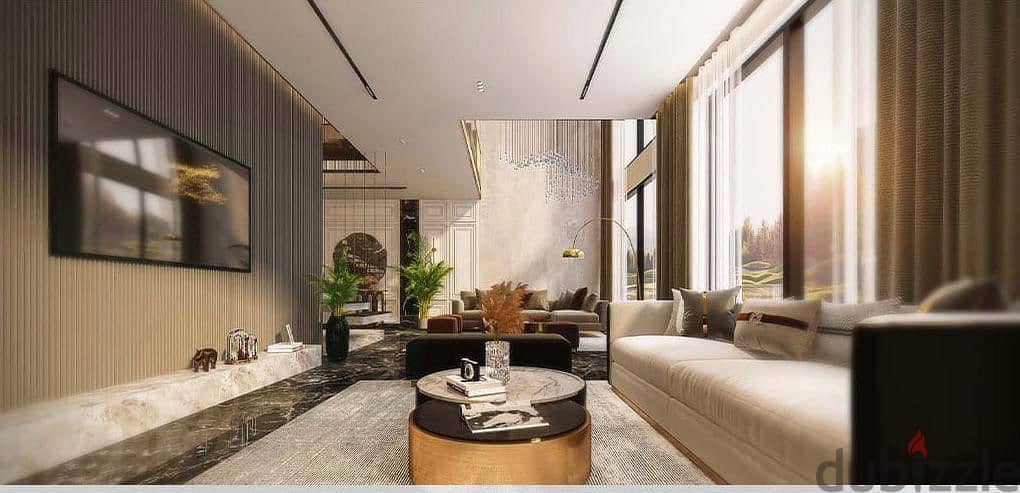 Duplex with installments for 10 years, open view to the Misr Mosque and the ministries, in front of two hotels, a university, the capital’s airport, a 3