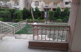Apartment for rent in Madinaty, the first ground floor residence with a private garden, directly in front of services, a very special location, with a 0
