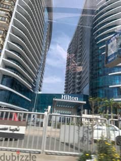 I own an apartment with immediate receipt, first row, on the Nile, fully finished, service by Hilton, under the management of Hilton Hotel