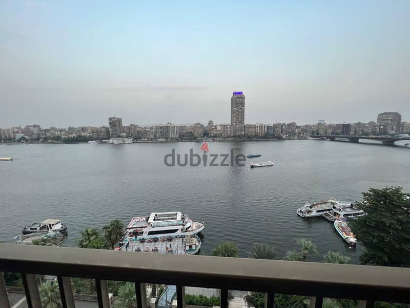 I own an apartment with immediate receipt, first row, on the Nile, fully finished, service by Hilton, under the management of Hilton Hotel 4
