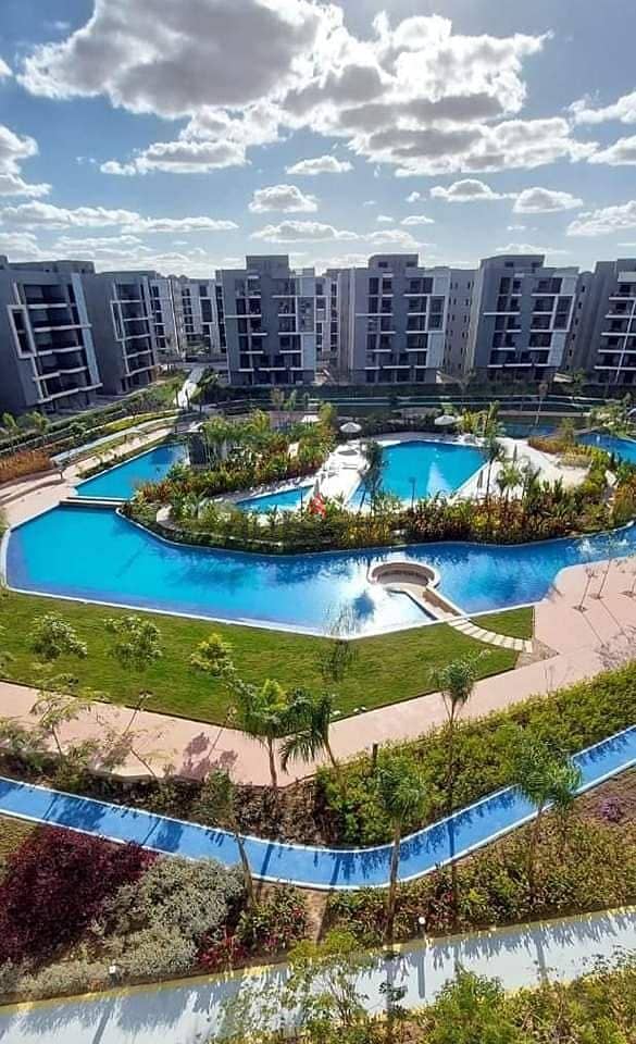 Apartment for sale, immediate receipt, 3 rooms, with a 10% down payment, in the most prestigious compound in Hadayek October, “Sun Capital” 3