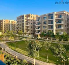 Apartment for sale, 111 meters, ground floor with garden, in Taj City phases