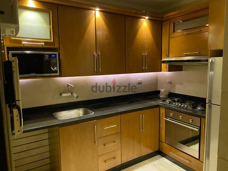 Super Luxe apartment, 110 m, steps from Abu Qir, with kitchen cupboard 3