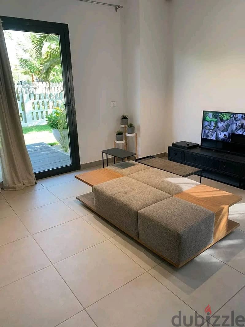 Duplex with garden for sale, immediate receipt, fully finished, directly in front of the International Medical Center Zodiac sign 7