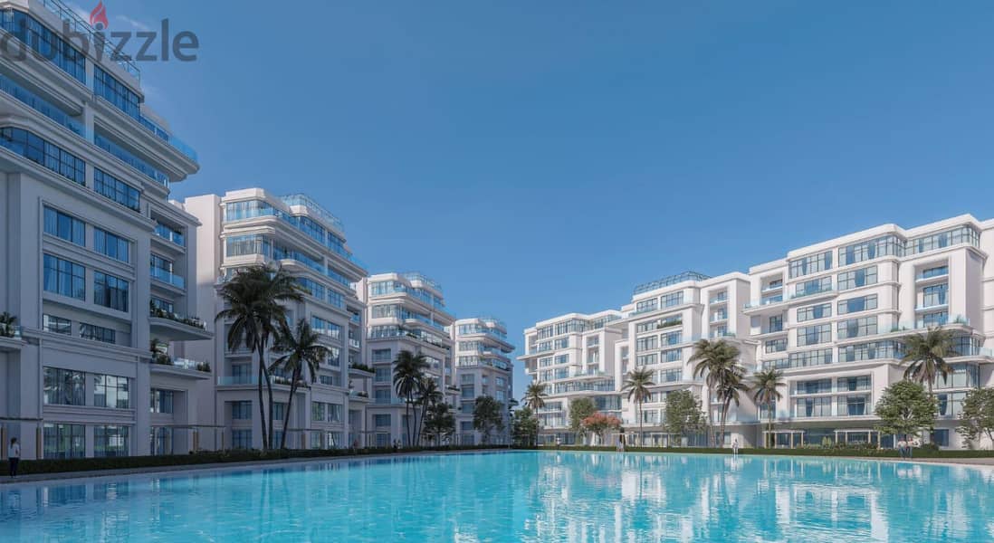 180-meter apartment for sale with a 10% down payment directly on the Lagoon in a full-service compound in the heart of the Administrative Capital 2
