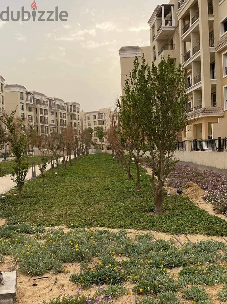 3-room apartment, spacious and distinctive, 144 sqm + private garden 147 sqm, for sale in Sarai Sur Compound, Madinaty Wall, with a 10% down payment 22