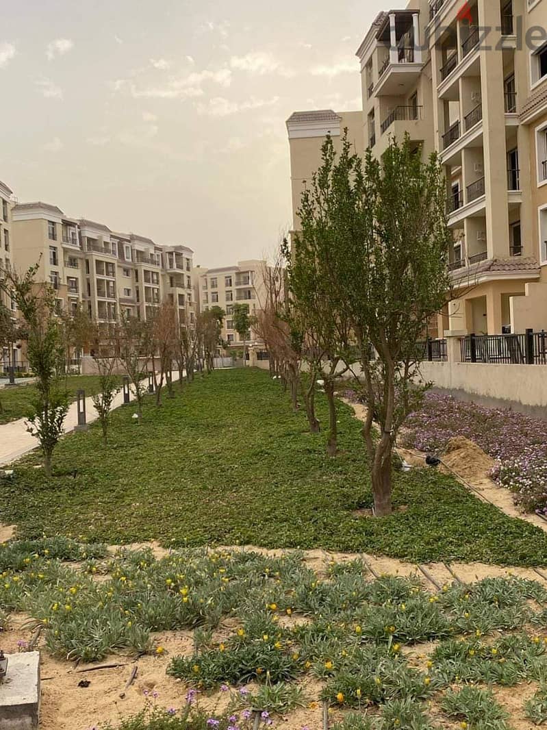 In the best stages of Sarai Compound, 165 sqm apartment with private garden, 193 sqm for sale, wall in Madinaty wall, Elan stage 7