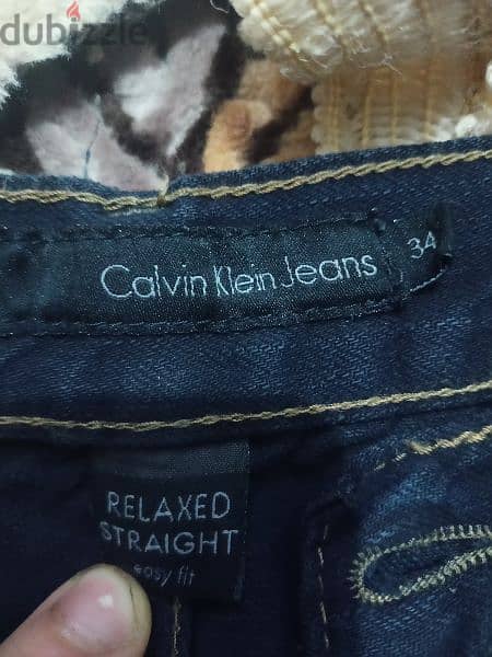 بنطلون Calvin Klein جديد مقاس ٣٤ وايد ليج مطبوع 2