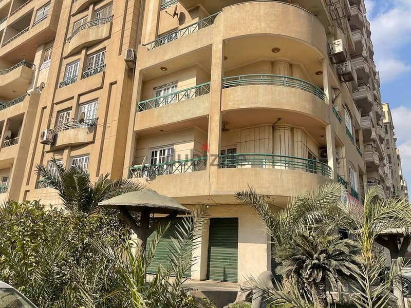 A commercial store for rent, area of ​​320 square meters, a distinctive location on three corners in the oasis, Nasr City, suitable for all purposes 1