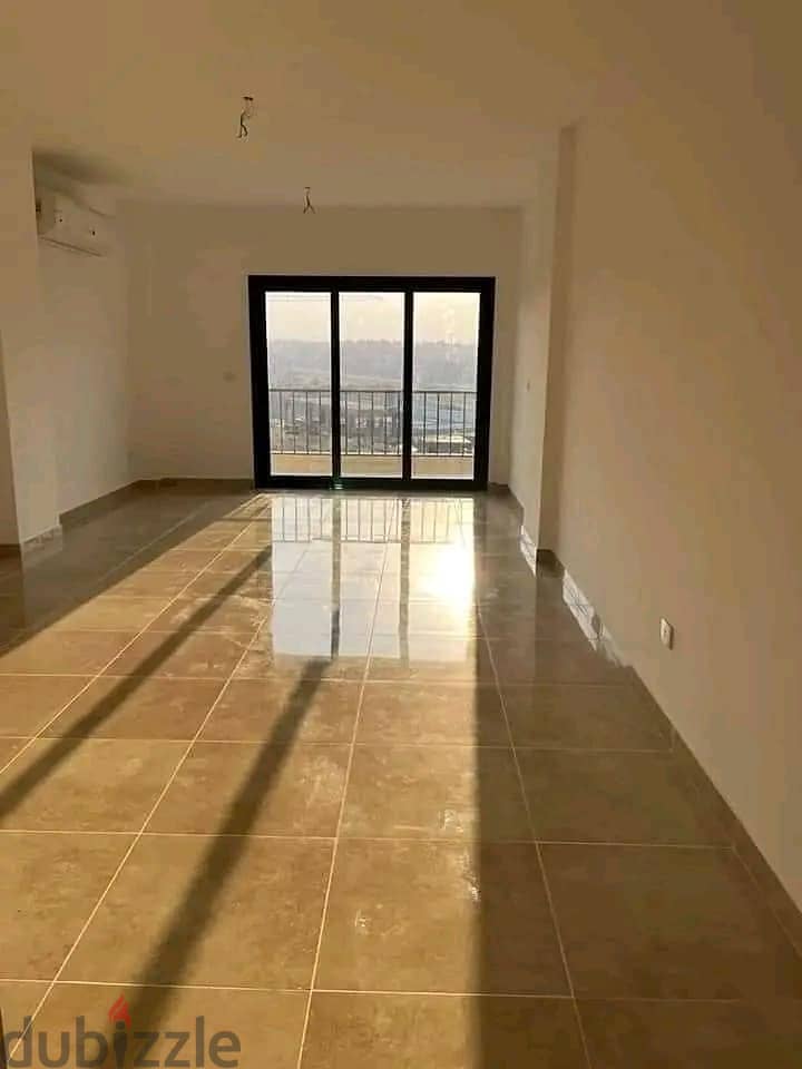 Apartment with roof in Vye Sodic Prime Location Compound in Sheikh Zayed 2