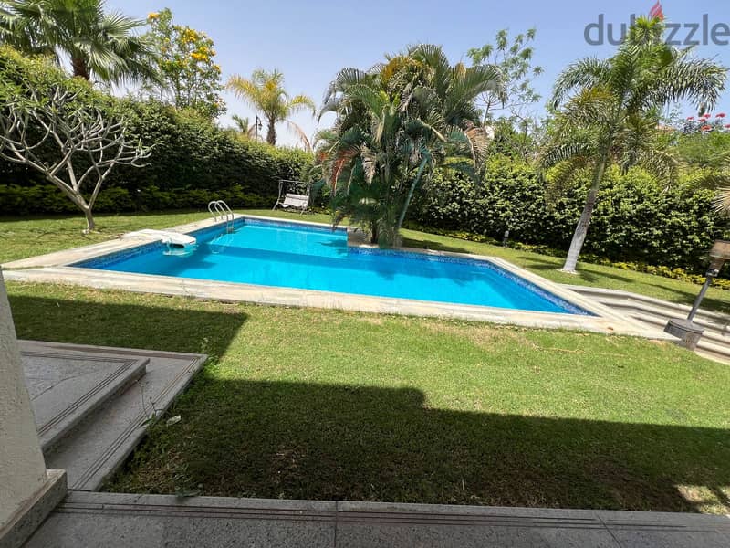 Mega twin house for sale in Sheikh Zayed Greens Compound swimming pool 1