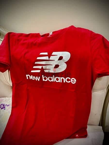 New balance Tshirt medium size 4