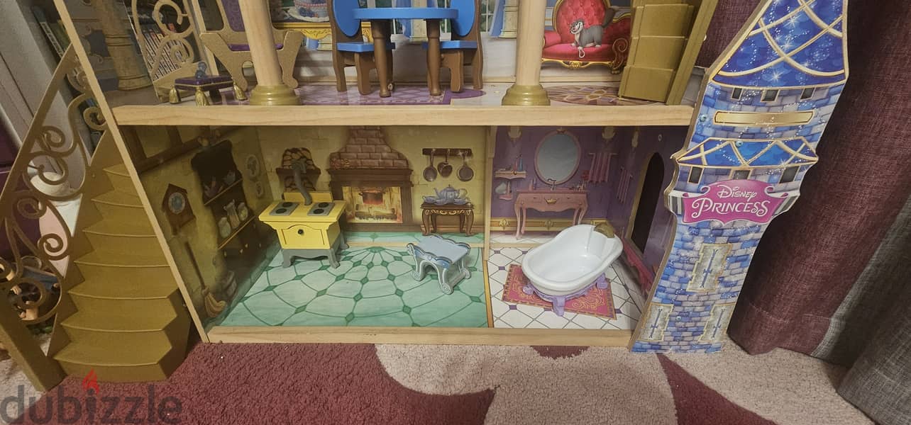 4 levels Cinderella doll house with dolls and alot of other  play sets 1