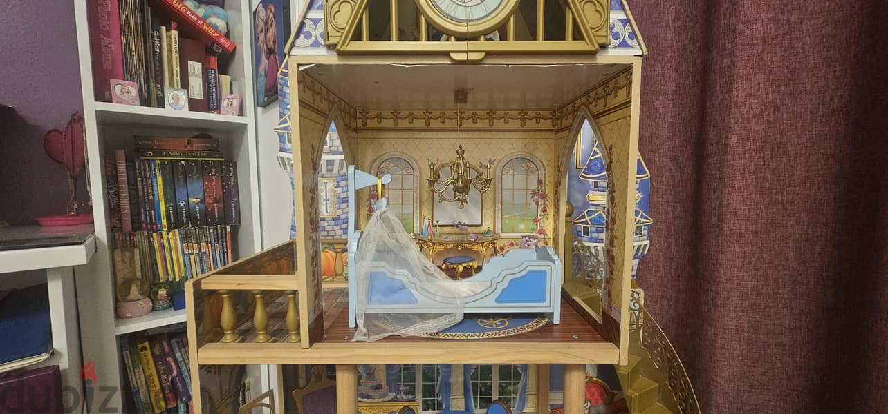 4 levels Cinderella doll house with dolls and alot of other  play sets 3