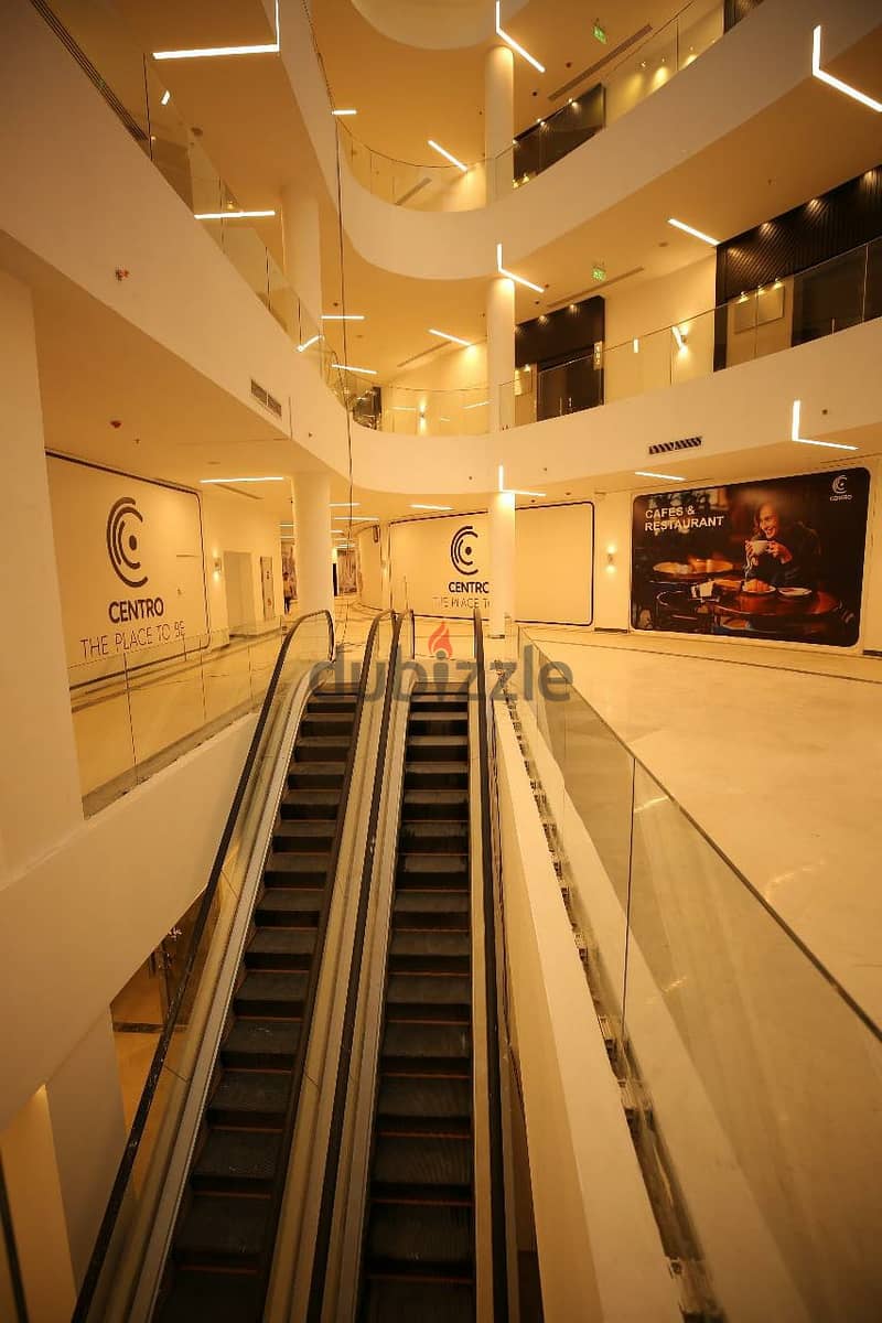Office for sale in a privileged location in the heart of New Cairo in front of the American University, an area of 148 meters, stores with an annual r 3