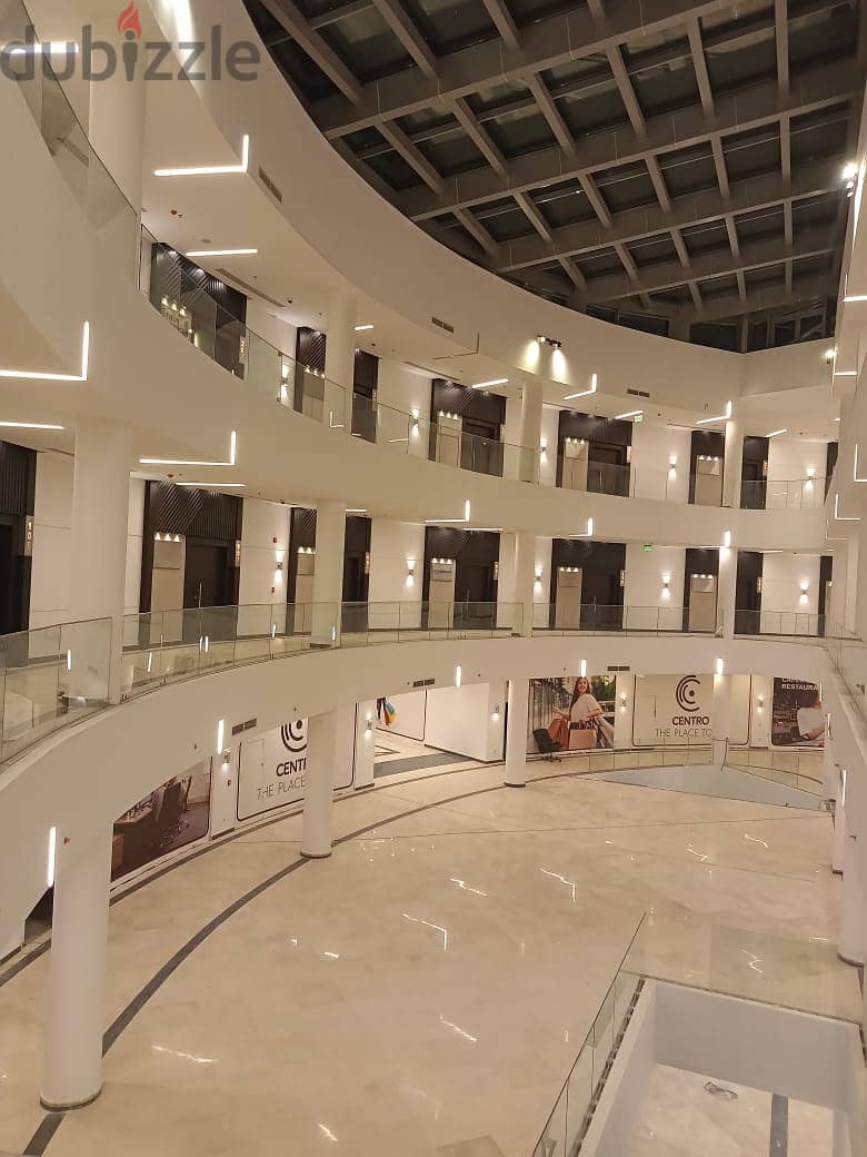 Office for sale in a privileged location in the heart of New Cairo in front of the American University, an area of 148 meters, stores with an annual r 8