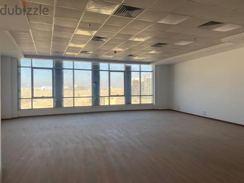 Office for sale in a privileged location in the heart of New Cairo in front of the American University, an area of 148 meters, stores with an annual r 17