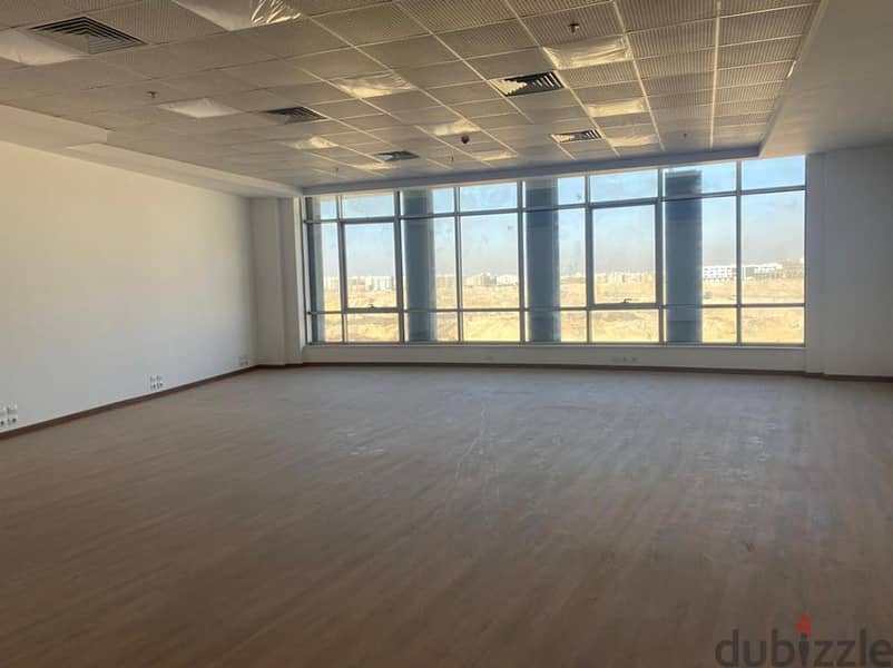 Office for sale in a privileged location in the heart of New Cairo in front of the American University, an area of 148 meters, stores with an annual r 18