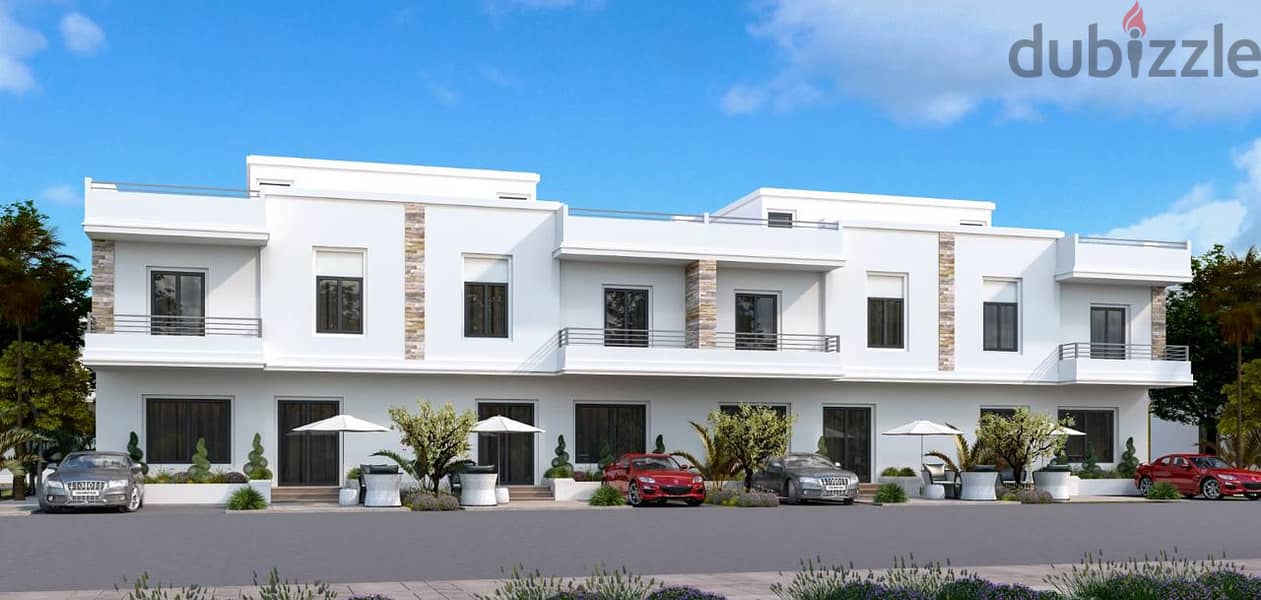 Townhouse villa with a 15% down payment and comfortable installments over 6 years, a prime location in Sheikh Zayed 2