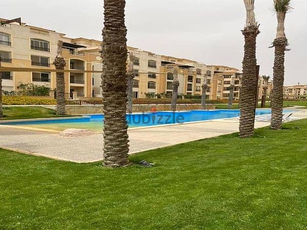 شقة ارضي بجنينة كبيرة للبيع في سراي القاهرة الجديدة بفيو علي البحيرات 1