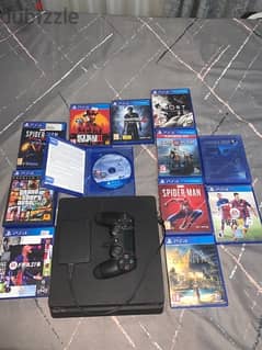 PS4 slim, controller, 2TB Extended storage, and 12 disc games