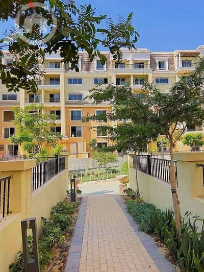 Distinctive 130 sqm ground apartment for sale with a spacious garden of 220 sqm directly on Suez Road, Sarai Compound, New Cairo 1