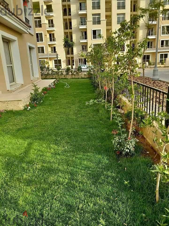 Distinctive 130 sqm ground apartment for sale with a spacious garden of 220 sqm directly on Suez Road, Sarai Compound, New Cairo 2