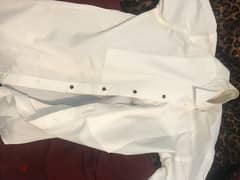 بدلة مقاس ٣٨ استخدام مرة واحدة و قميص خاص بها ابيض 0