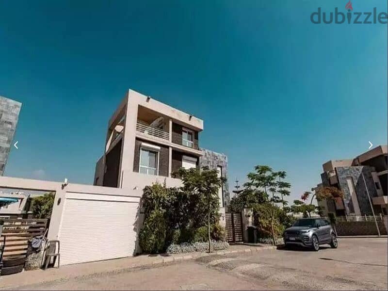 Stand alone villa for sale, 240 m, in Sarai Compound, New Cairo, on Suez Road, directly next to the ring road, the American University, the New Admini 1