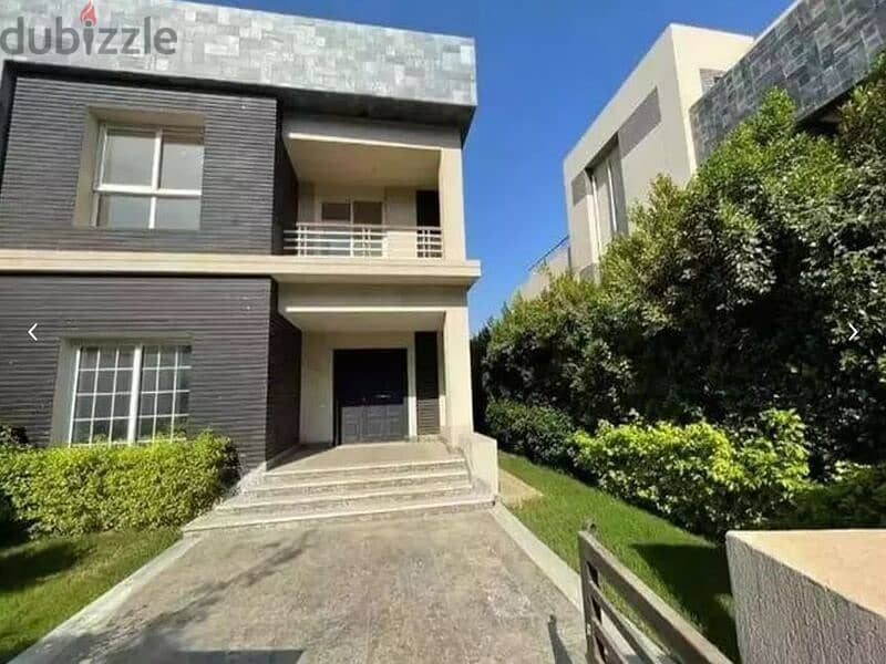 Stand alone villa for sale, 240 m, in Sarai Compound, New Cairo, on Suez Road, directly next to the ring road, the American University, the New Admini 2