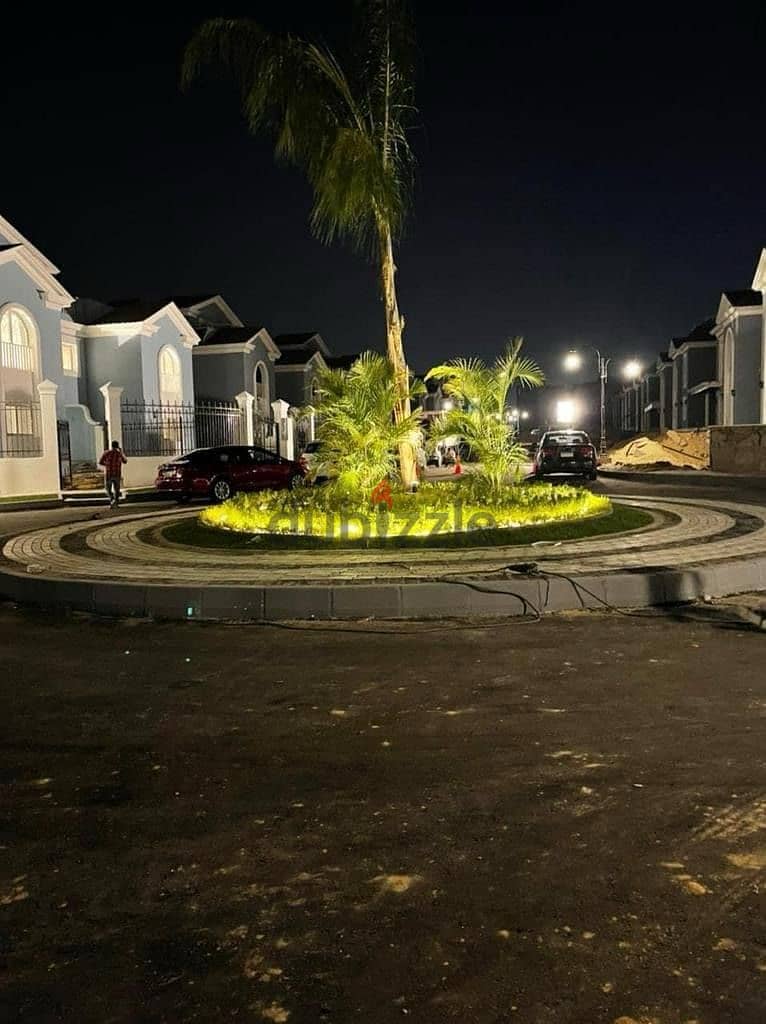 Immediate receipt villa in Obour City for sale in installments, enjoying privacy, ready to live inside a compound with a wonderful private garden. 9