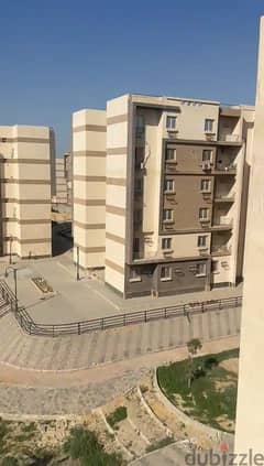 Apartment for sale, area of 118 square meters, in the Misr Residence Compound, on Al-Wahat Road, October entrance 0