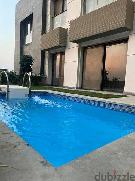 Apartment for sale in Trio Gardens Compound, in installments, fully finished 5