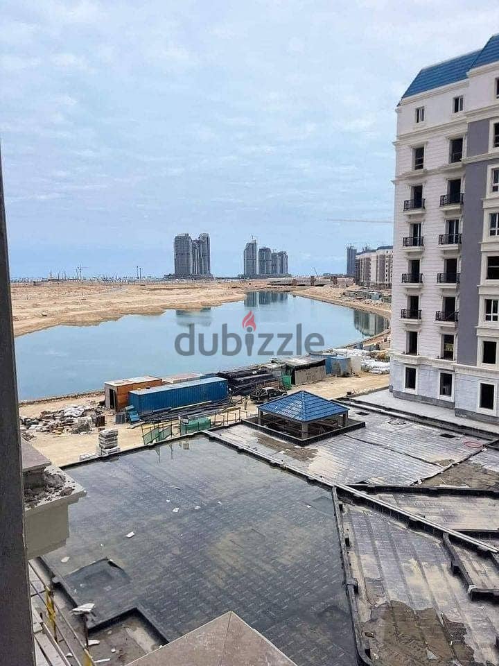 Finished apartment ready for delivery, 234 sqm, for sale, with a fantastic view on the Lagoon and El Alamein Towers, in the new city of El Alamein, in 7