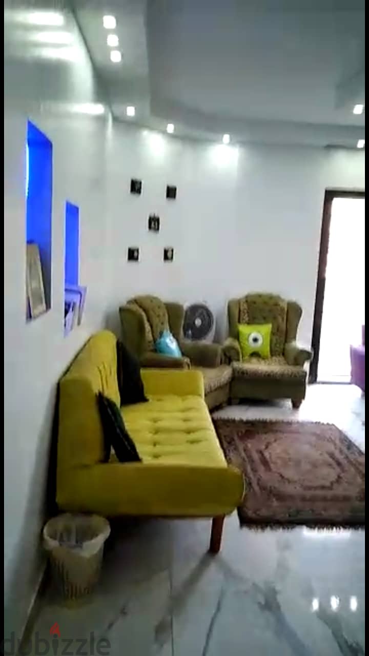 Ground floor apartment with garden, excellent location in Al-Fardous City, Al-Zohour Compound 4