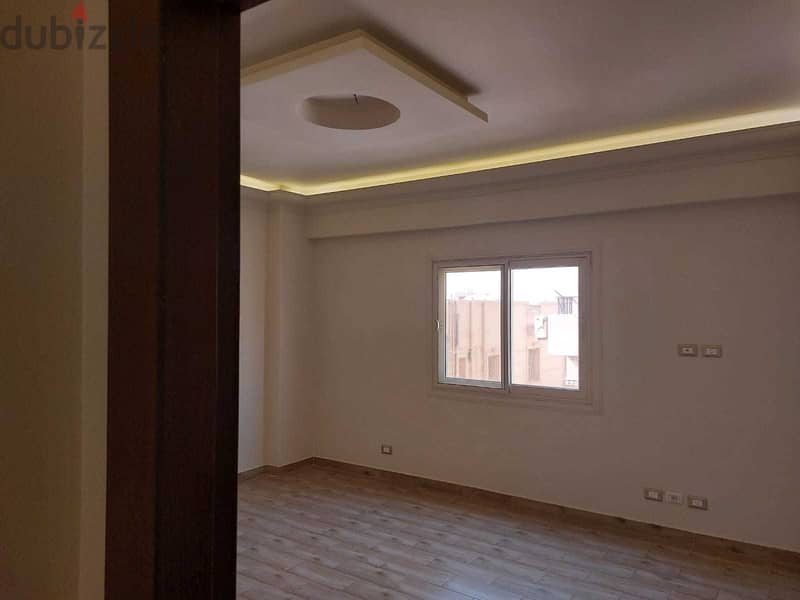 apartment for rent in the most luxurious villas, Al Yasmine, with a garden view , steps from the northern 90th new cairo 1