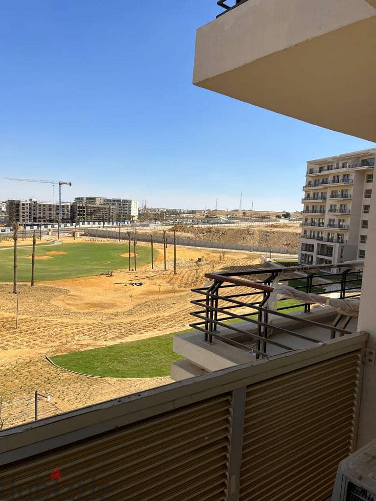 Apartment for rent in Uptown Cairo Compound - Emaar - semi furnished with kitchen, air conditioning and dressing - view on golf prime location 2