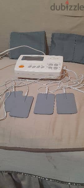 جهاز طبي للعلاج الطبيعي والمساج بالنبضات الكهربائية 5