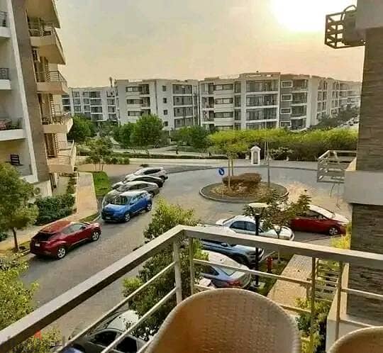 Apartment with garden with panoramic view, 164 sqm (3 rooms), with a 39% discount, for sale in installments over 8 years, in Taj City, New Cairo 2