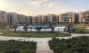 own an apartment in Galleria Moon Compound in Fifth Settlement 9
